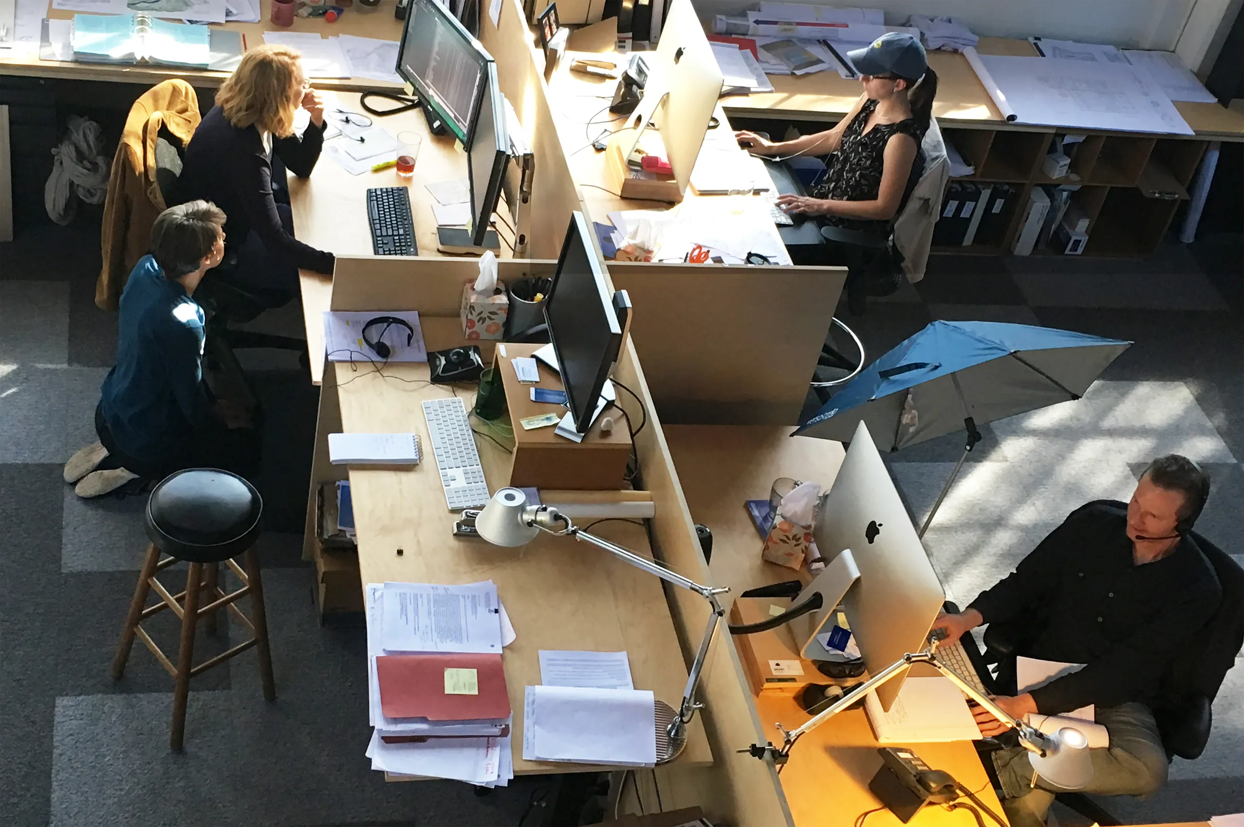Siegel & Strain staff at work in the firm's open-plan studio